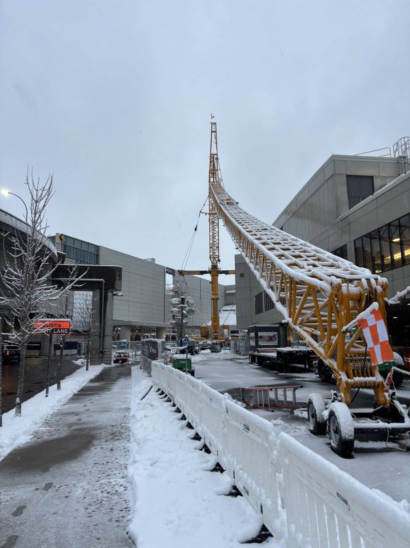 Maxim Crane Works LTM 1750 working in winter conditions at Boston Logan
