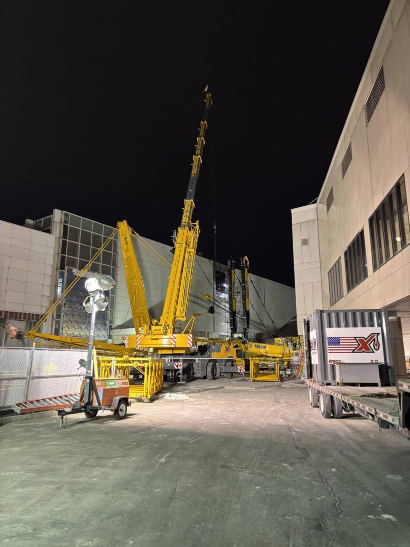 Night-time crane build at Boston Logan Terminal E