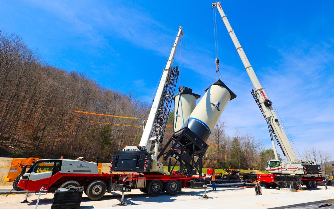 Link-Belt ATC-3275 all terrain crane and 120|HT truck crane lifting an ASTEC silo section in tandem in Kentucky