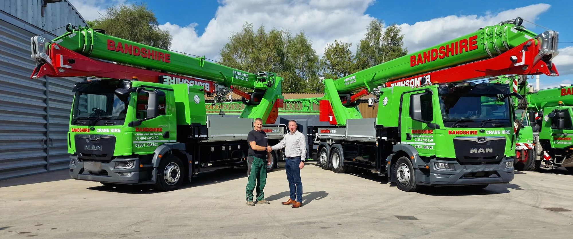 Two new Böcker AK 42 and AK 48 truck cranes in Bandshire green and red livery