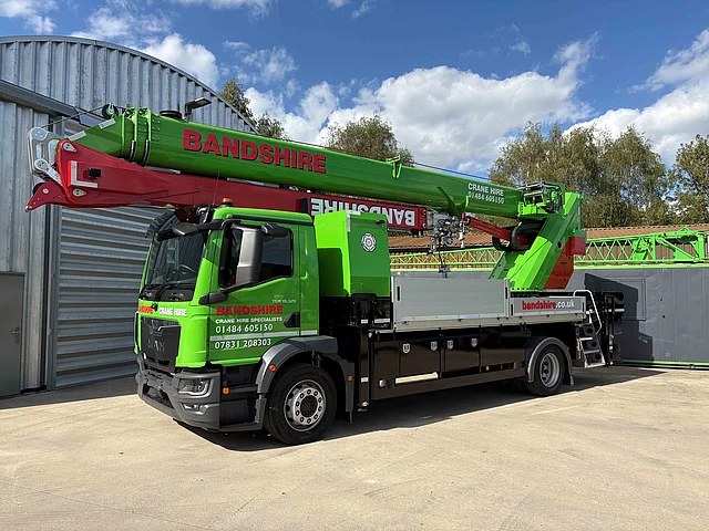 Böcker truck crane in Bandshire colours on a MAN chassis at the company yard