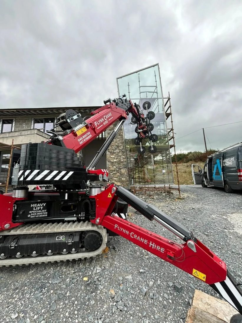 Hoeflon C30e compact crane set up on a constricted glazing site in Ireland
