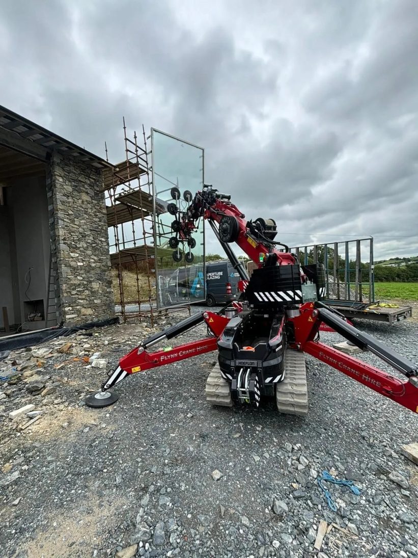 Glass panel handled by the Hoeflon Multitool and S1000 vacuum lifter