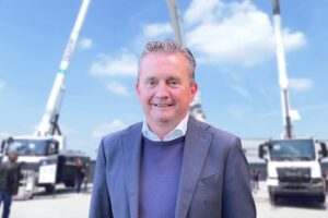 Ivo Heuvelmans, managing director of Böcker Nederland, in front of Böcker truck cranes