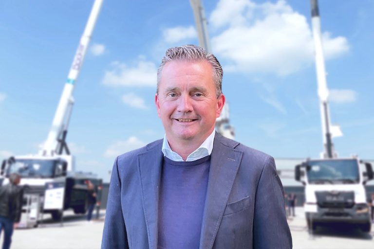 Ivo Heuvelmans, managing director of Böcker Nederland, in front of Böcker truck cranes