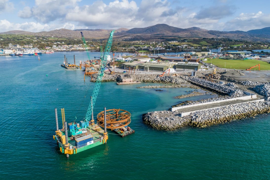 Aerial view of the Dinish Wharf expansion at Castletownbere with Kobelco crawler cranes on site