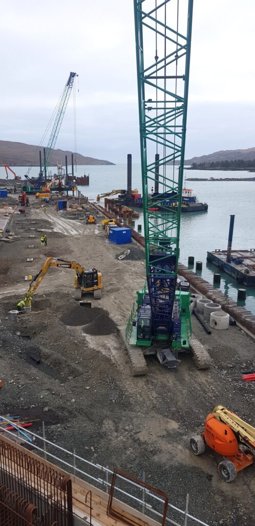 Kobelco crawler crane driving piles during the Dinish Wharf quay expansion in County Cork