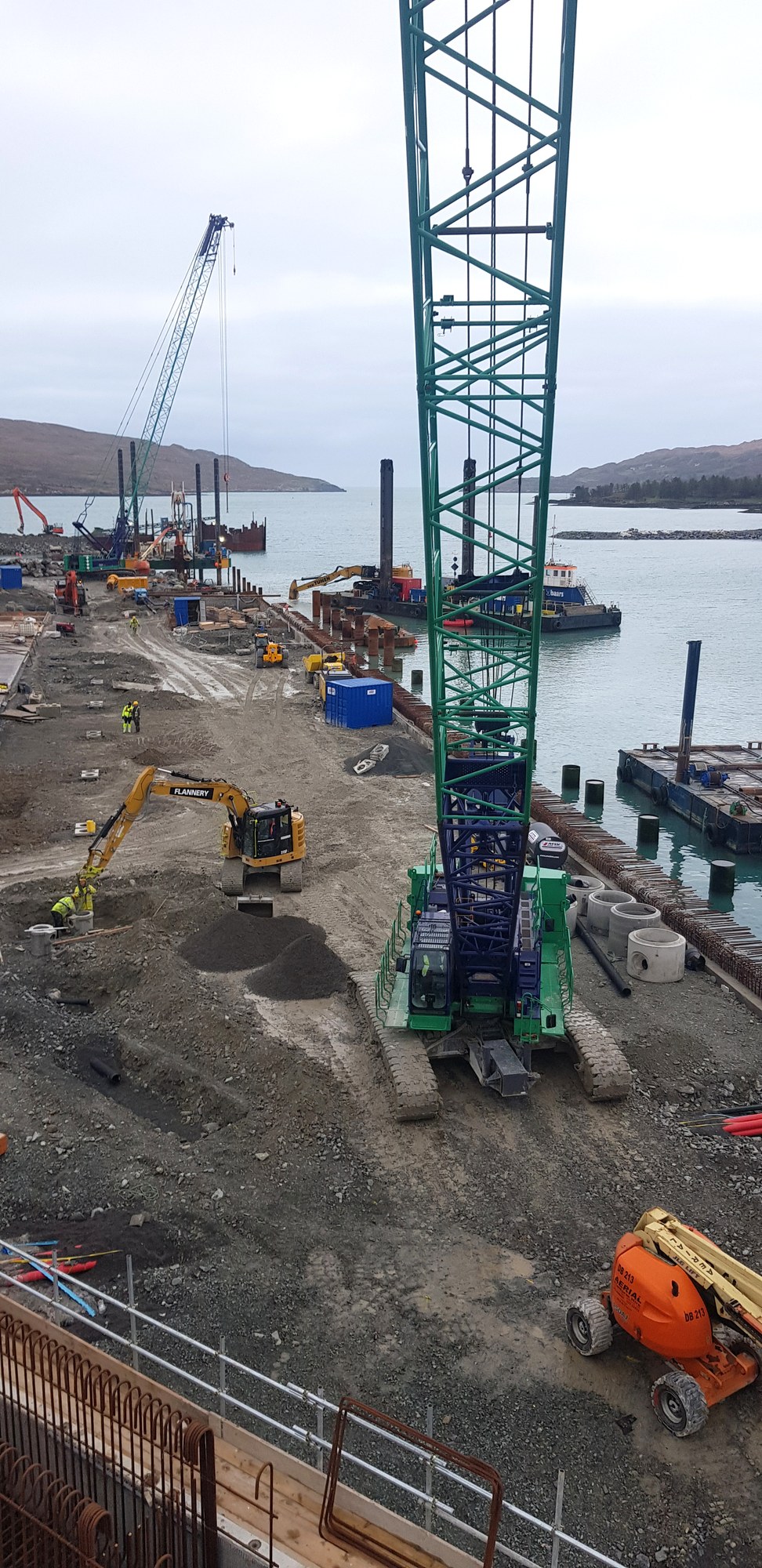 Kobelco crawler crane driving piles during the Dinish Wharf quay expansion in County Cork