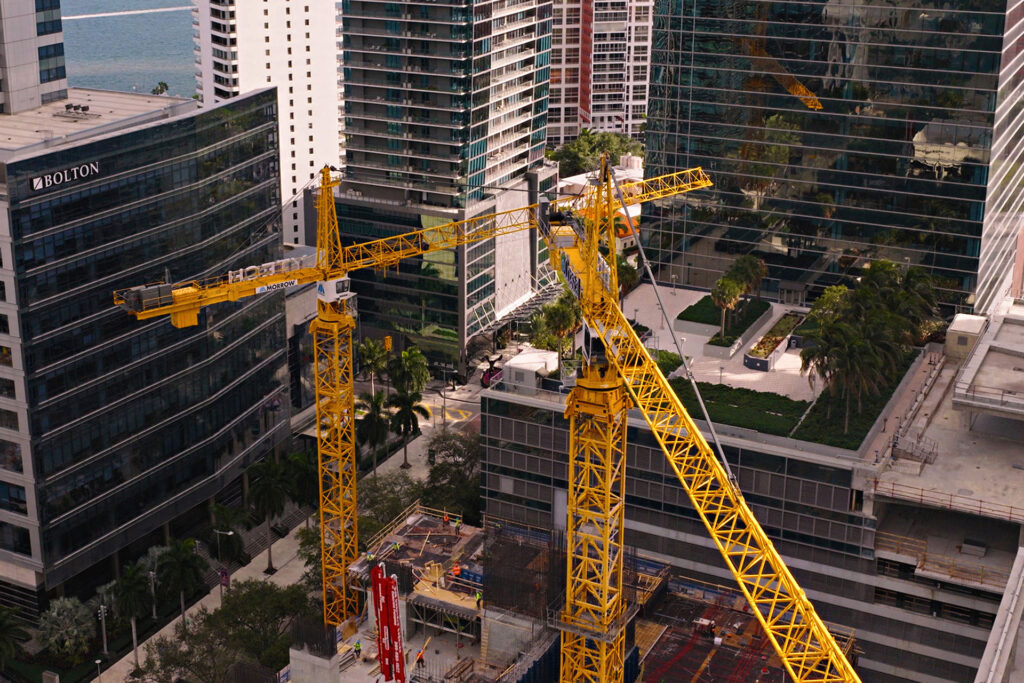 Liebherr tower cranes on high-rise construction sites in Miami