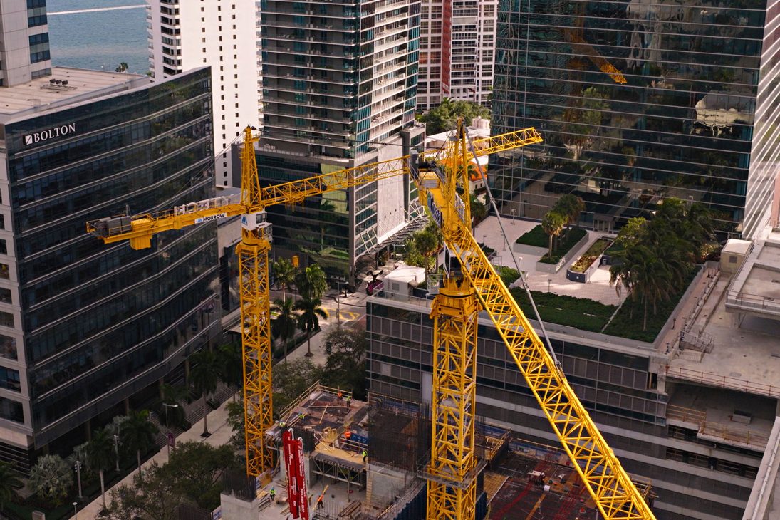 Liebherr tower cranes on high-rise construction sites in Miami