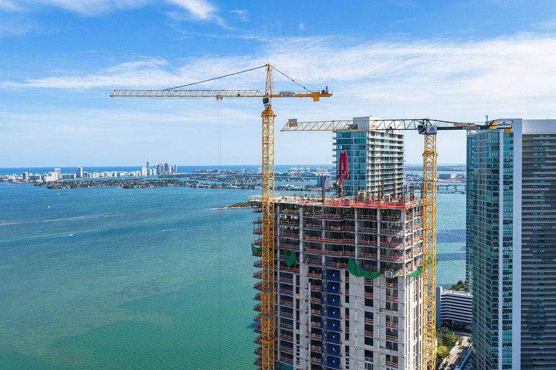 Liebherr tower cranes on high-rise construction sites in Miami