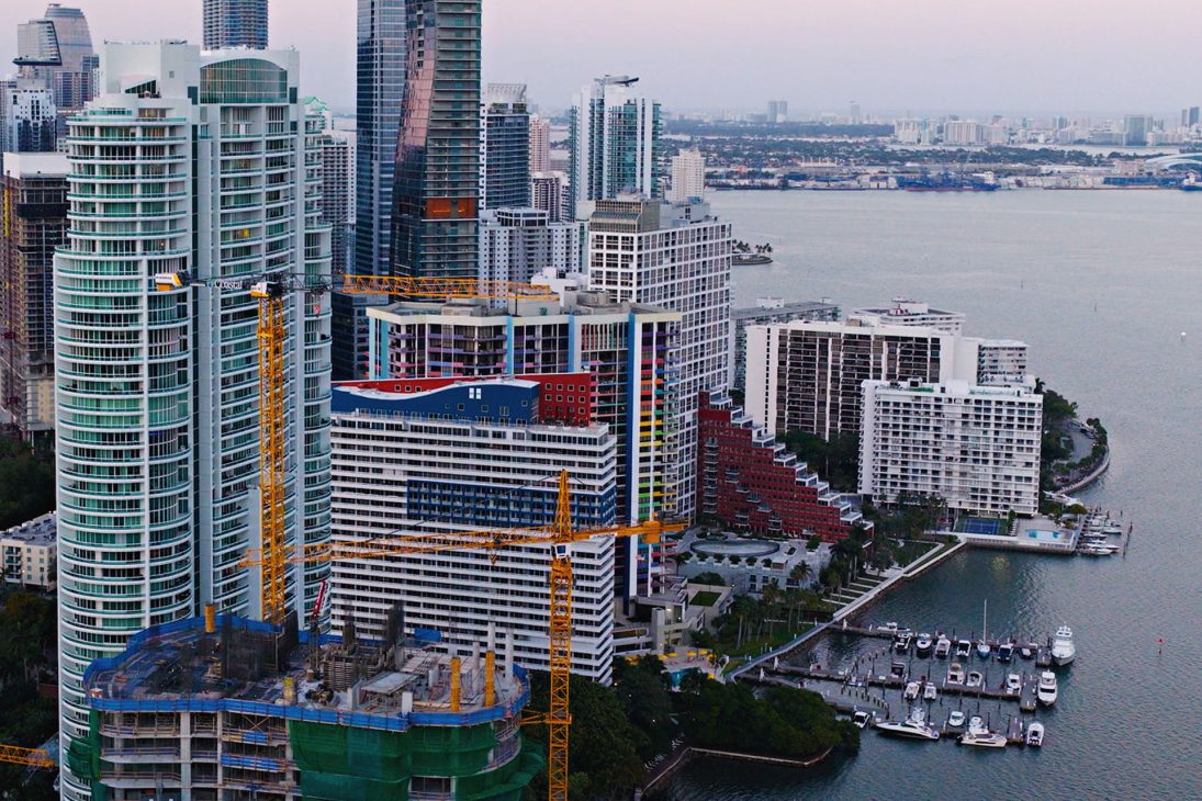 Liebherr tower cranes on high-rise construction sites in Miami
