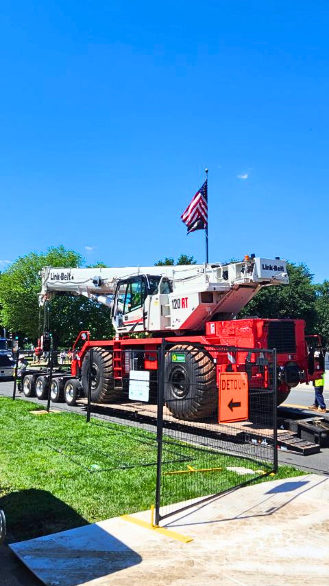 Link-Belt 120|RT rough terrain crane rigged on the National Mall in Washington D.C. with a US flag behind