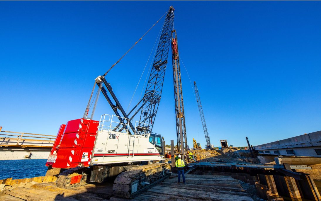 Link-Belt 218|V HSL Series lattice crawler crane driving pile on the I-57 expansion in southern Illinois