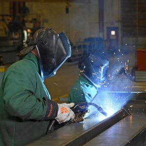 Welders fabricating crane structural components at Manitowoc’s Rapid Response Shop in Shady Grove, Pennsylvania