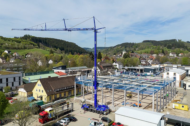 Liebherr MK 120-5.1E mobile construction crane placing roof sheeting at Lenzkirch