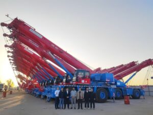 SANY rough terrain and all-terrain cranes lined up at handover to a Saudi rental company working on Aramco projects