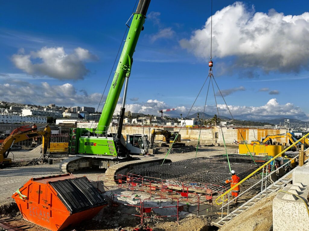 Crane operator positioning a reinforcement cage on the Nice foundation works