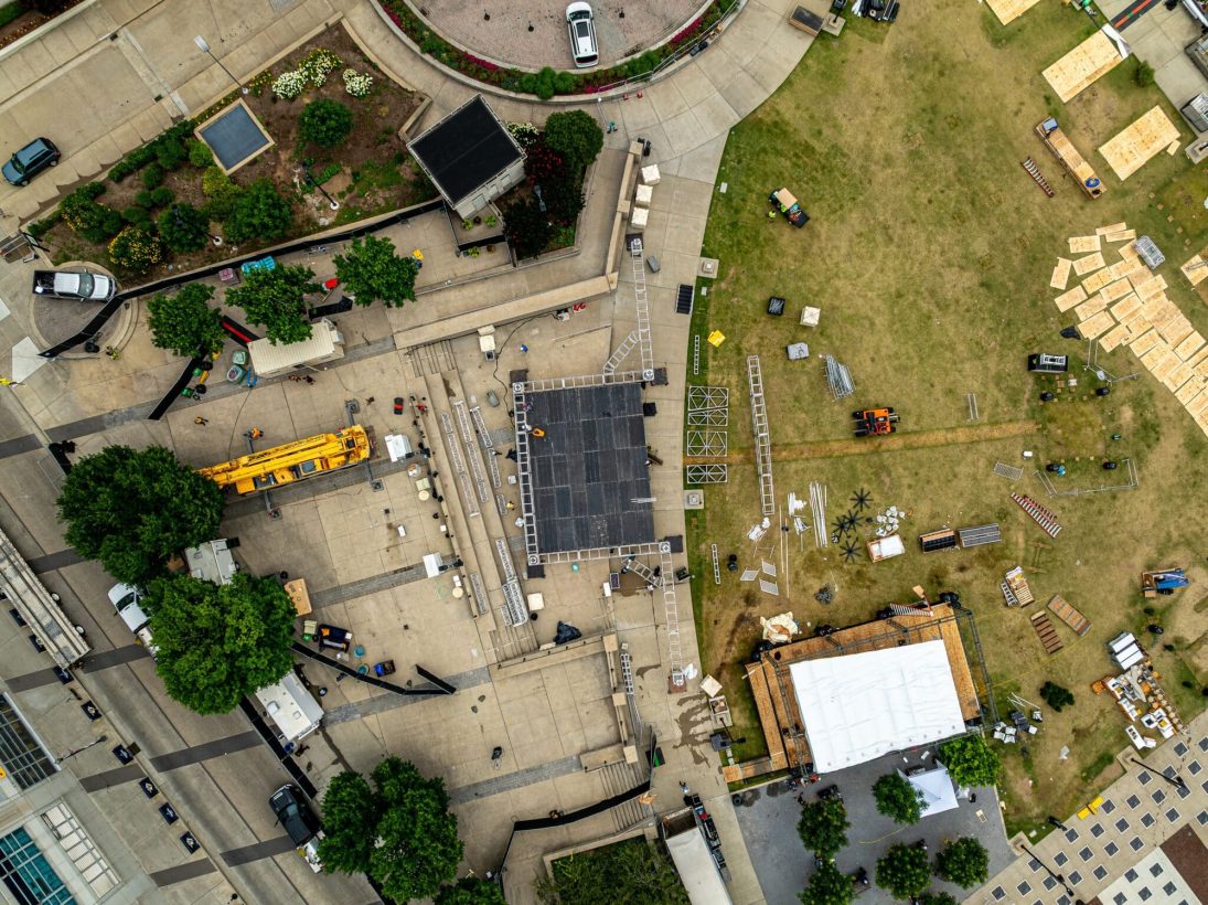 Overview of a CMA Fest stage build with crane in position