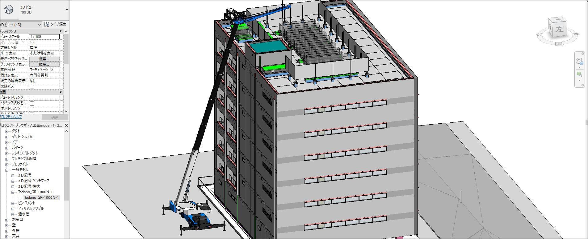 BIM model in Autodesk Revit showing a Tadano GR-1000N-1 rough terrain crane positioned alongside a building