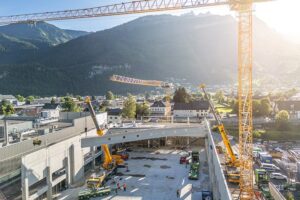 Liebherr LTM 1300-6.3 lifting a prestressed concrete truss at the Getzner factory in Bludenz