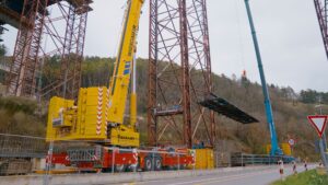 Wiesbauer Tadano AC 7.450-1 all terrain crane lifting a steel bridge element at the Neckartal bridge near Horb