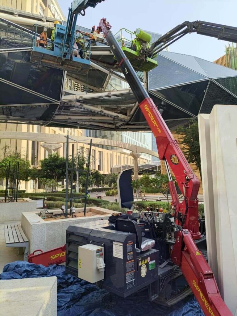 GL-UMC600 glass manipulator suspended from the UNIC URW-547 during the KAFD façade works