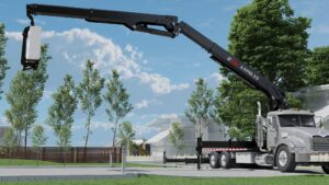 HIAB K-HiPro 515 loader crane on a US truck placing a bundle of building board