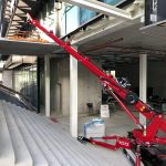 Hoeflon C10 mini crane at work inside a building