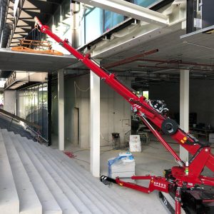 Hoeflon C10 mini crane at work inside a building