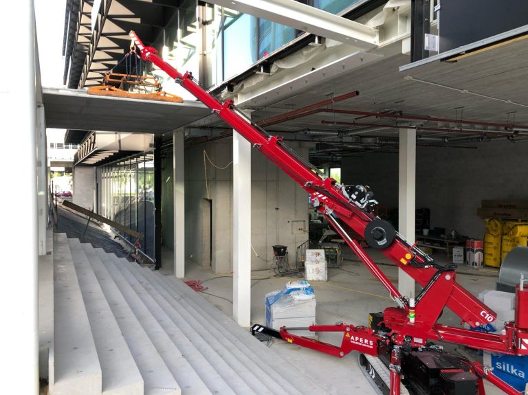 Hoeflon C10 mini crane at work inside a building