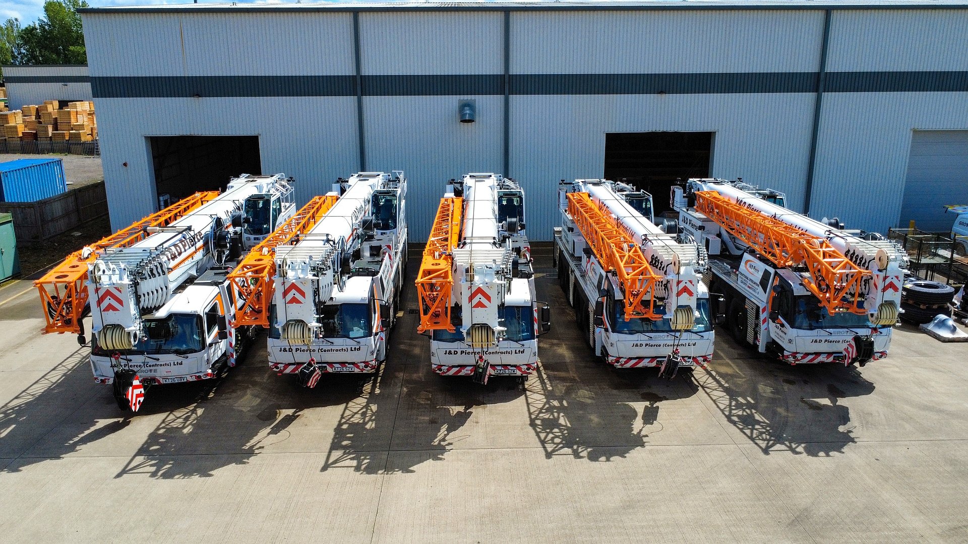 Fraser Pierce, Jamie Pierce and Dave Ryan of J&D Pierce with Derek Kidd of Manitowoc at the Grove crane handover