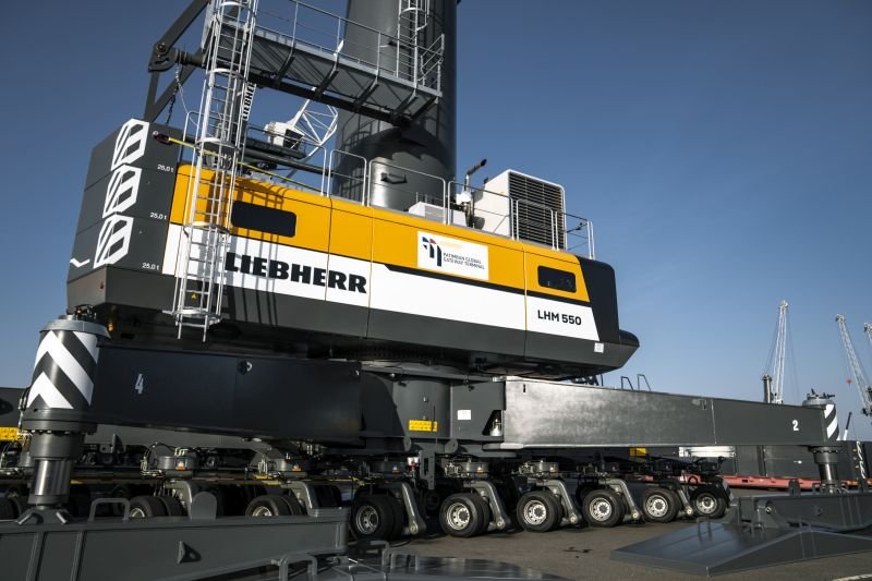 Liebherr LHM 550 mobile harbour crane handling containers at Patimban Global Gateway Terminal, Indonesia