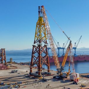 Liebherr LR 12500-1.0 crawler crane assembling jacket substructures at an offshore wind farm site in South Korea