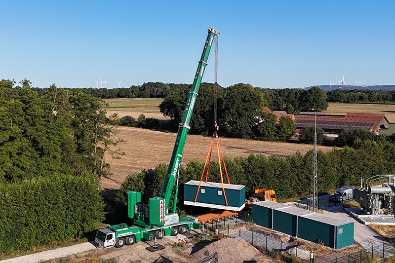 Jandt's new Liebherr LTM 1400-6.1 lifts a 60-tonne transformer station on its first job in Bad Laer. Photo: Liebherr