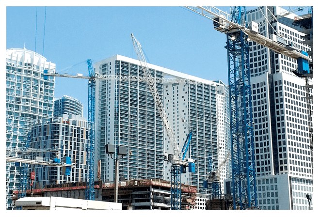 Luffing and hammerhead tower cranes at work on Brickell City Centre in Miami