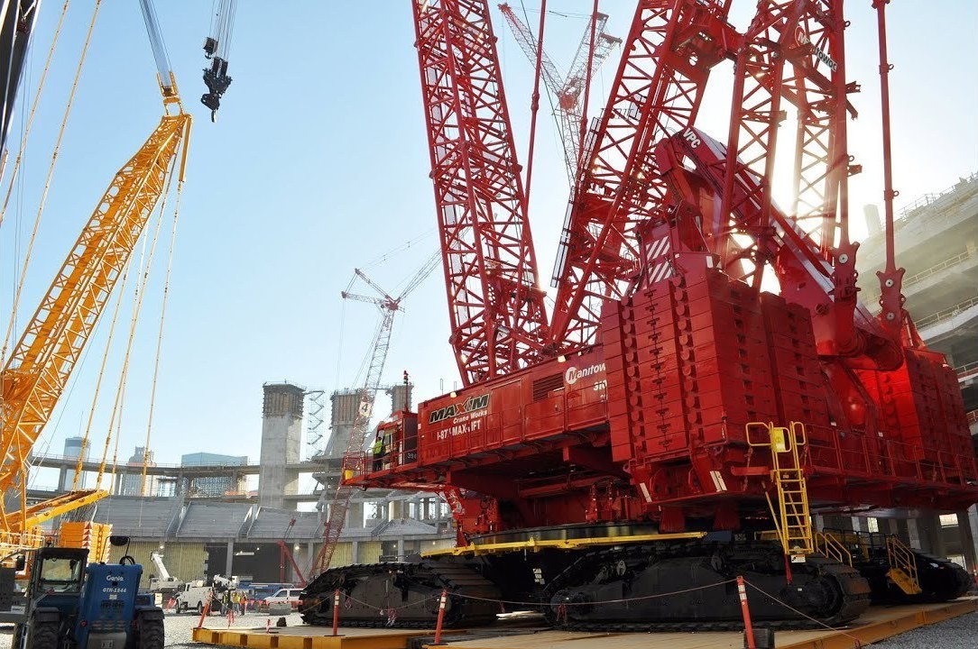 Maxim Crane Works Manitowoc crawler crane during roof works at Mercedes-Benz Stadium