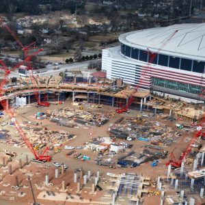 Crawler cranes inside the Mercedes-Benz Stadium bowl during construction in Atlanta