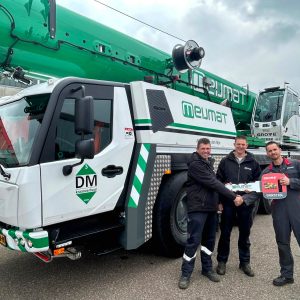 Grove GMK5120L all-terrain crane handover to Meijmat, with Dennis Merks and Rob Lepelaats of Meijmat and Daniel van Beurden of Manitowoc
