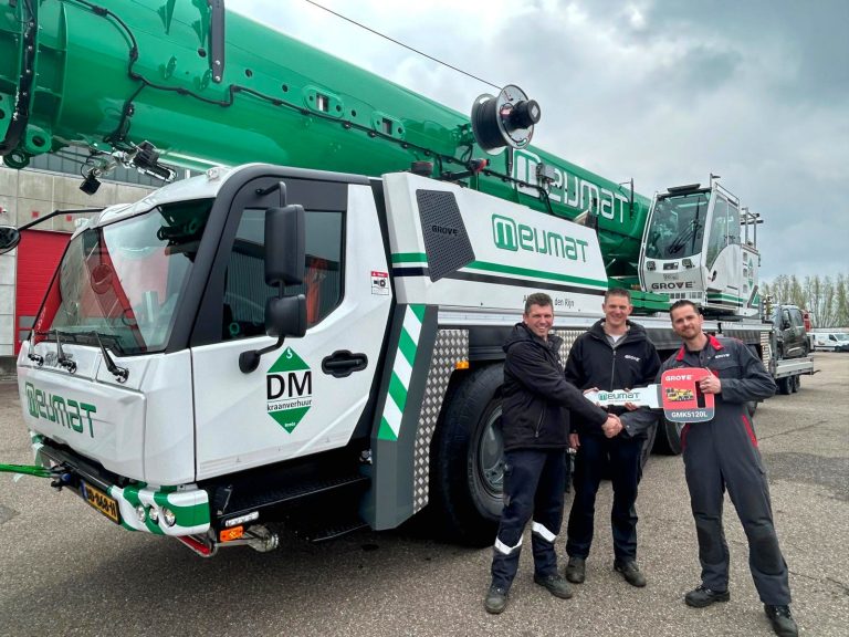 Grove GMK5120L all-terrain crane handover to Meijmat, with Dennis Merks and Rob Lepelaats of Meijmat and Daniel van Beurden of Manitowoc