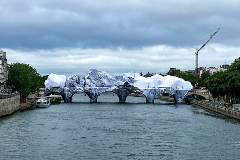 Liebherr MK 88-4.1 mobile construction crane repairing the La Caverne du Pont-Neuf art installation in Paris