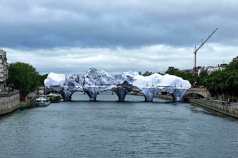 Liebherr MK 88-4.1 mobile construction crane repairing the La Caverne du Pont-Neuf art installation in Paris