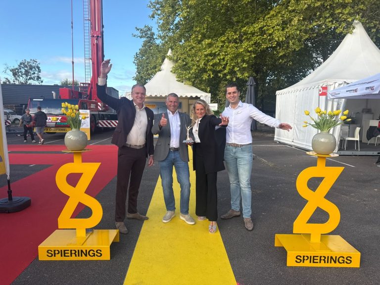 Spierings team receiving the JDL d'Or 2026 award for eLift electric lifting technology at JDL Expo in Beaune