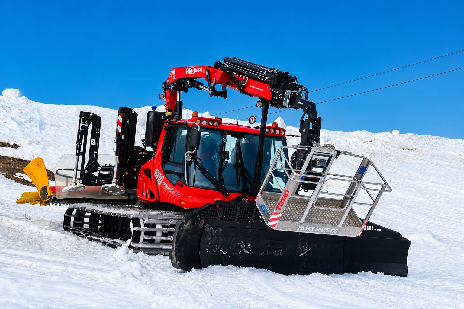 Tadano PM 18 SP loader crane mounted on a PistenBully snow groomer at the Kronplatz ski resort