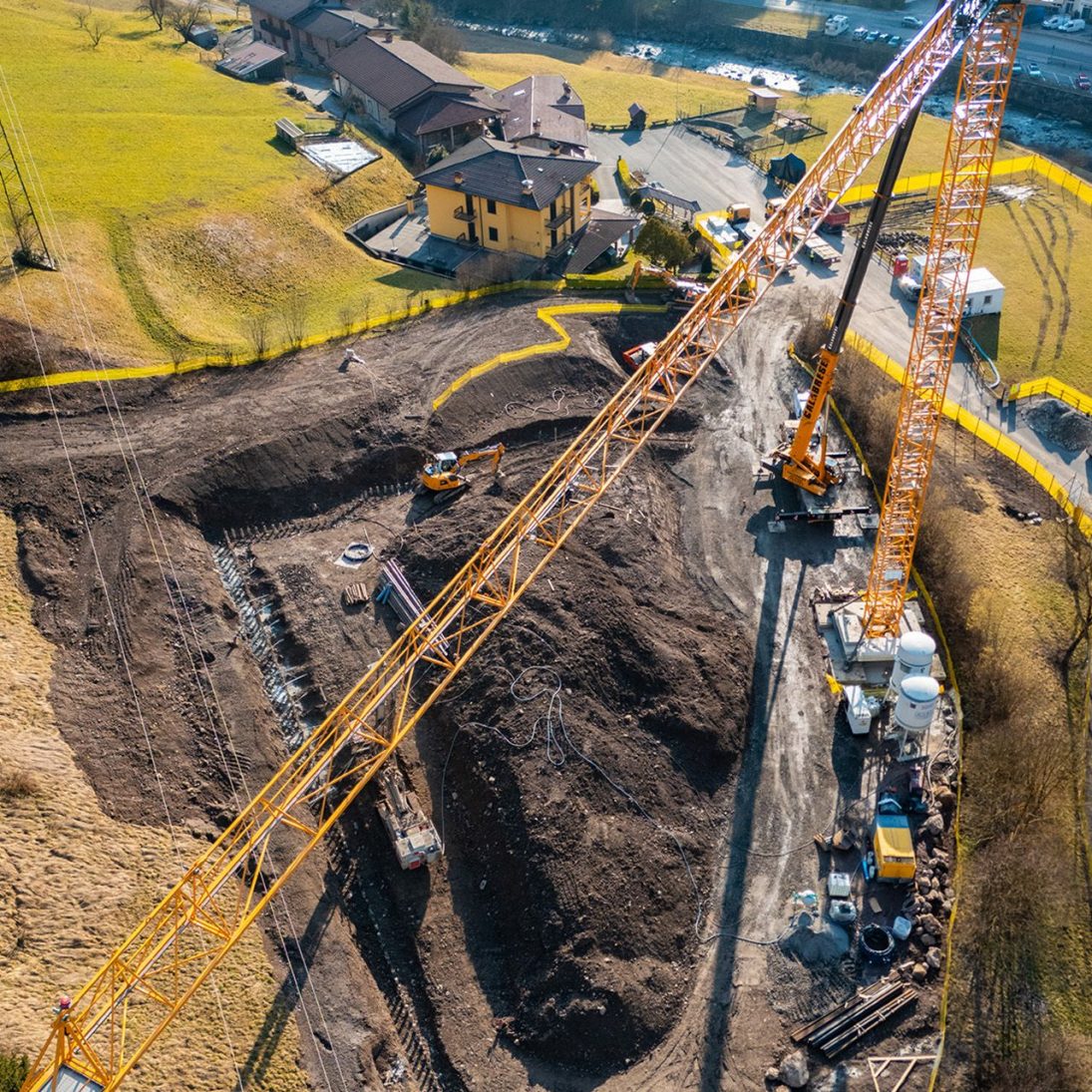 The 240 EC-B Fibre handling loads on the mountainside construction site at Bovegno