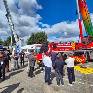 Grove GMK5150XLe Plug-in Hybrid all-terrain crane in Bryn Thomas Cranes livery on the Manitowoc stand at Vertikal Days 2026