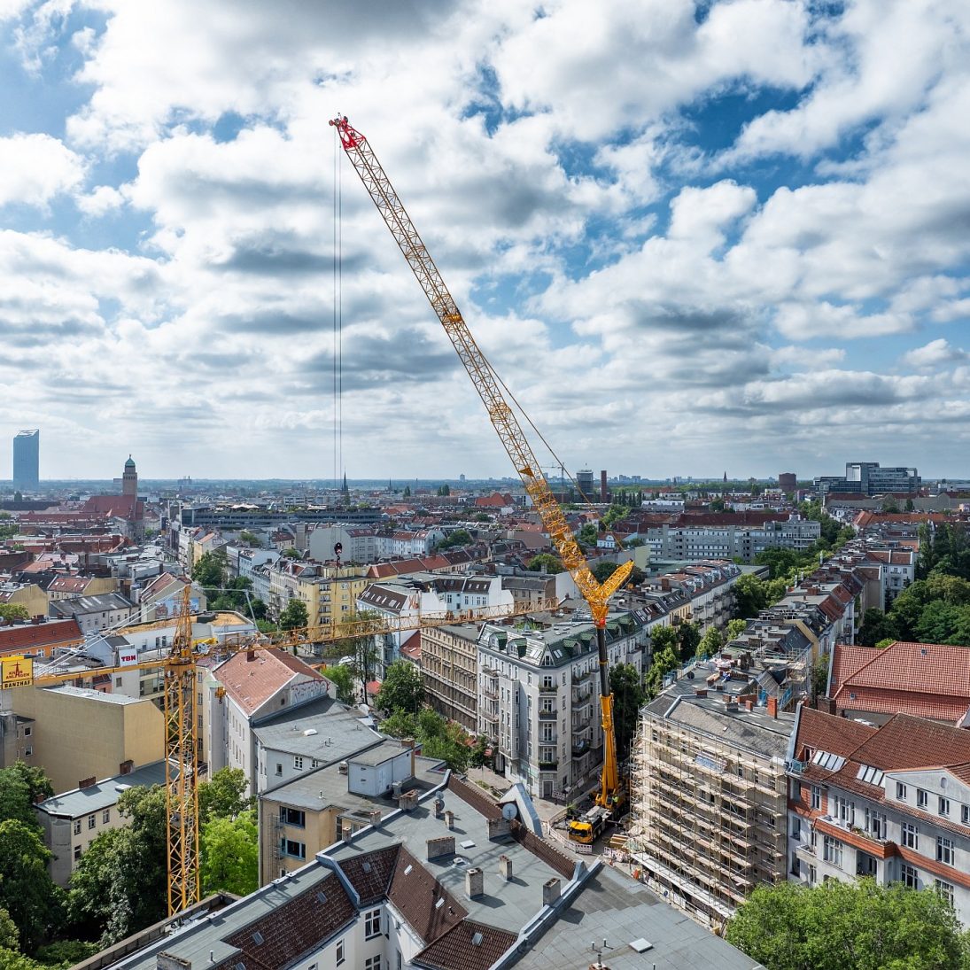 GMK6450-1 with luffing jib working at long radius over Berlin rooftops
