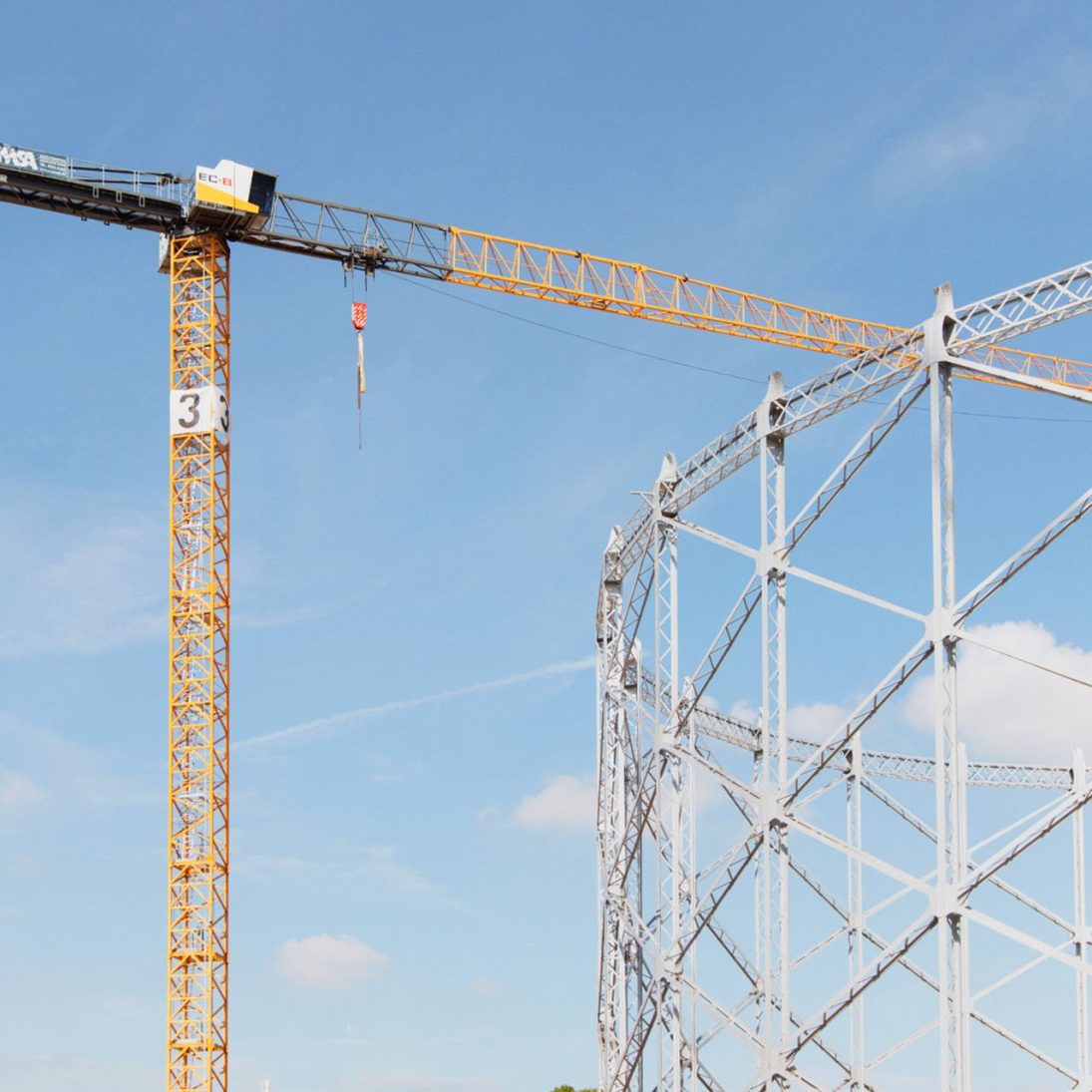 Liebherr flat-top tower cranes working on the historic gasometers at the Politecnico di Milano campus