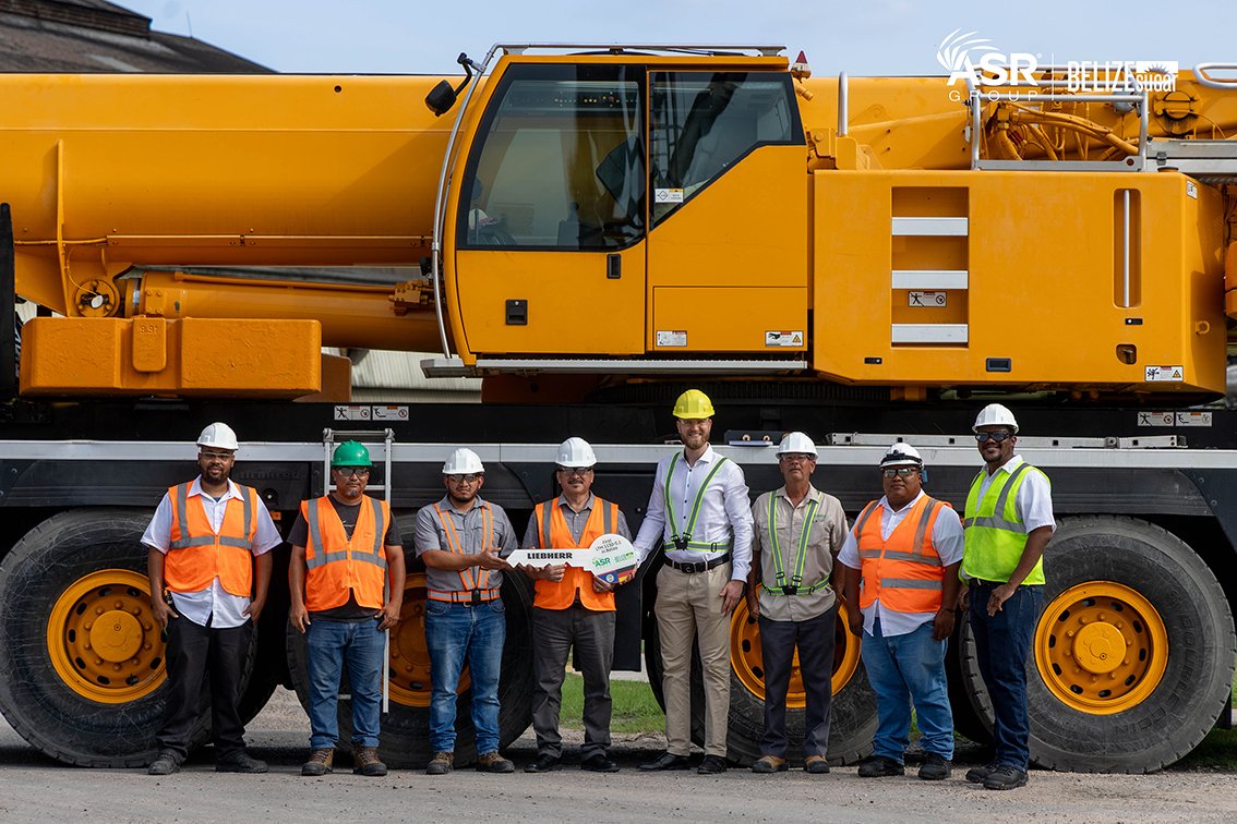 Handover of the LTM 1130-5.1 at Tower Hill, Belize, with teams from BSI and Liebherr Mexico