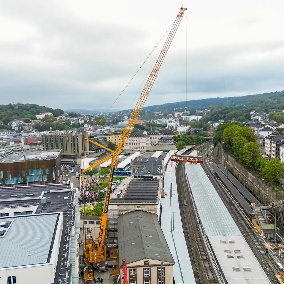 Liebherr LTM 1450-8.1 lifting the historic Series 50 suspension railway carriage in Wuppertal